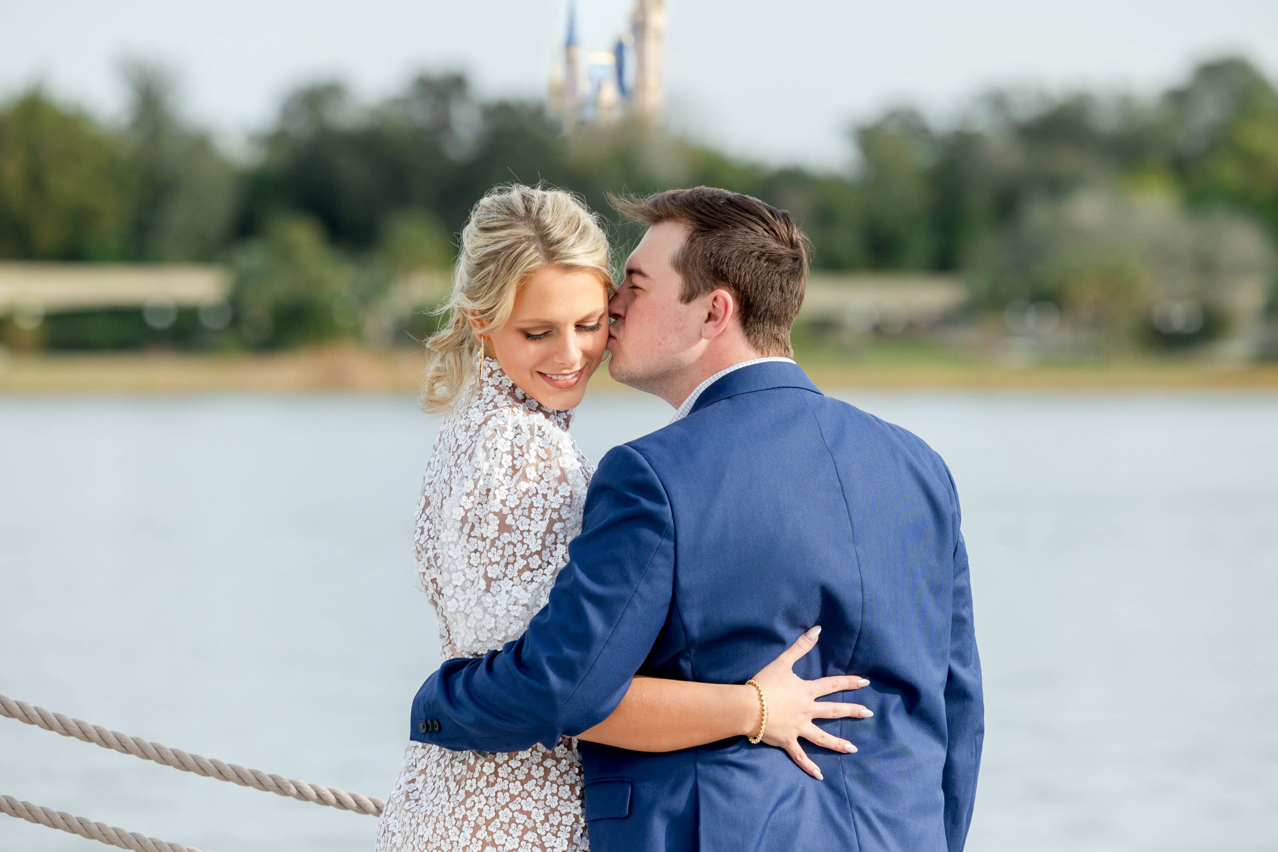 engagement photos at Disney's grand Floridian resort with the castle in the background