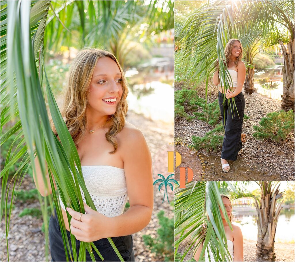 Senior girl posing by the main pool at Orange Lake Resort in a casual outfit, smiling under the palm trees.