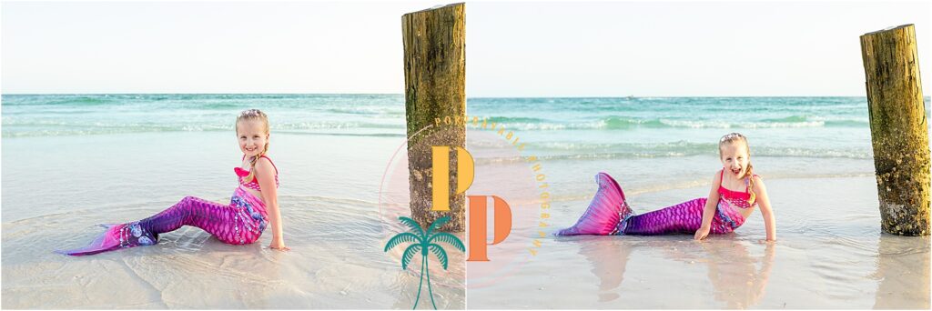 Little girl in mermaid tail laughing and splashing in the shallow waves during her photoshoot