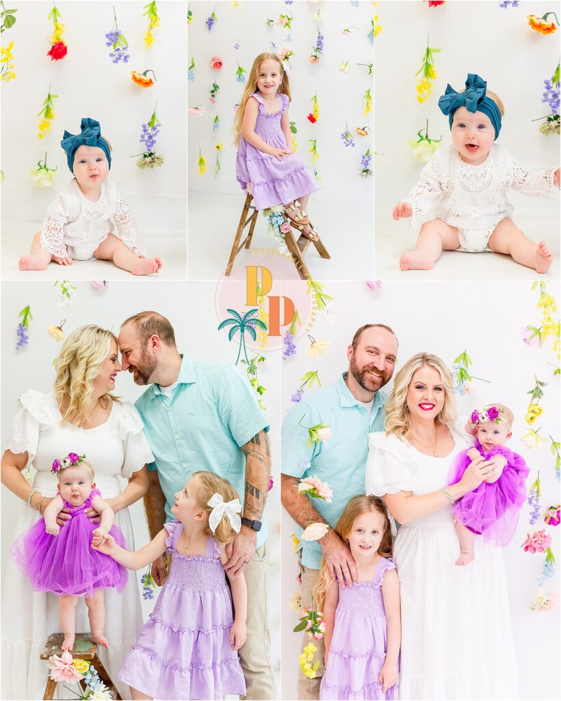 Family standing in white studio smiling together.