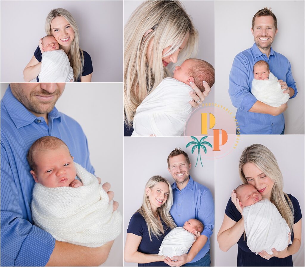 Big sisters holding newborn baby brother during Orlando in-home session.